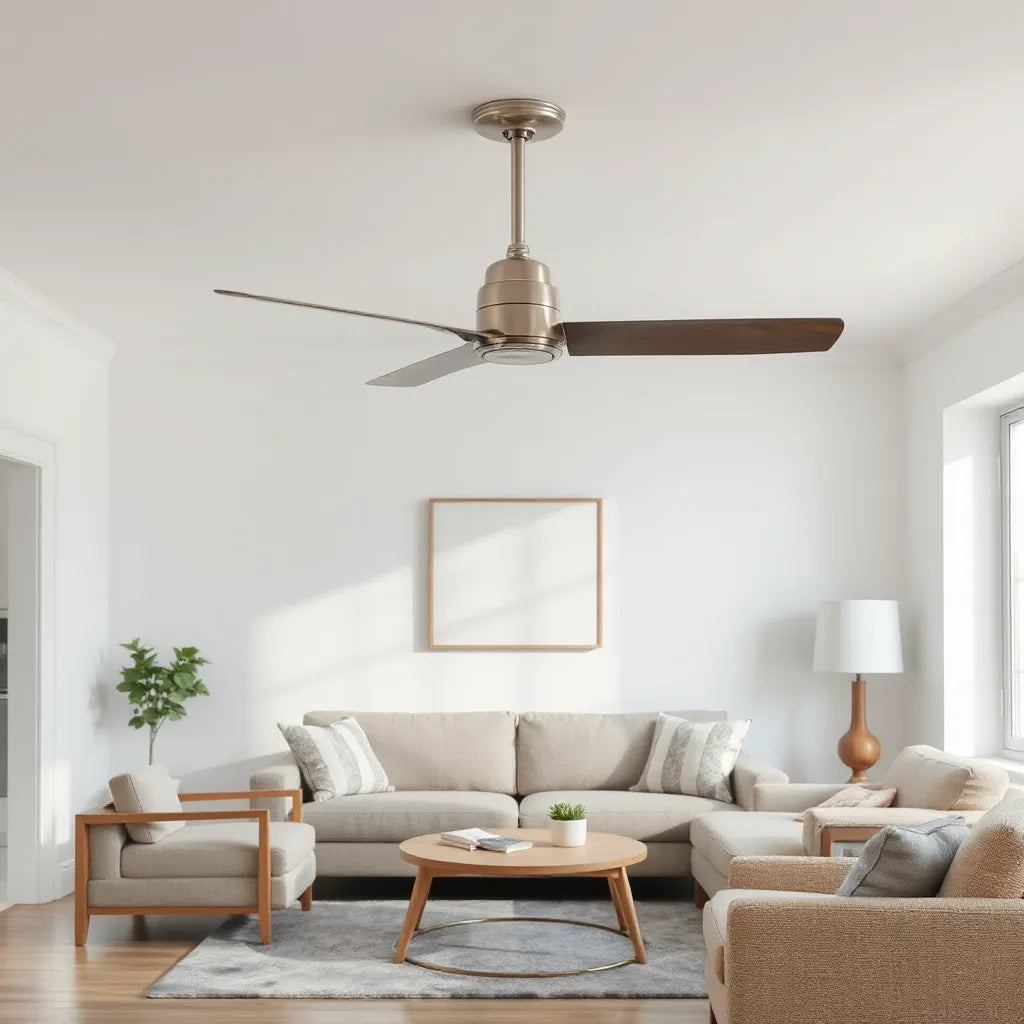 Modern ceiling fan with brushed metal finish in a bright, minimal living room