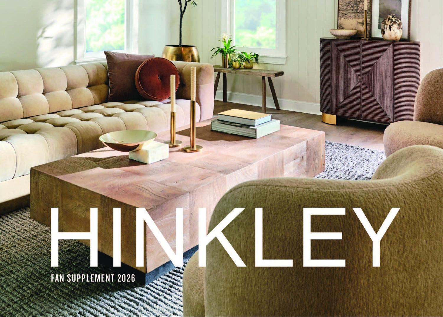 Living room with Hinkley ceiling fan and furniture, featuring the brand name.